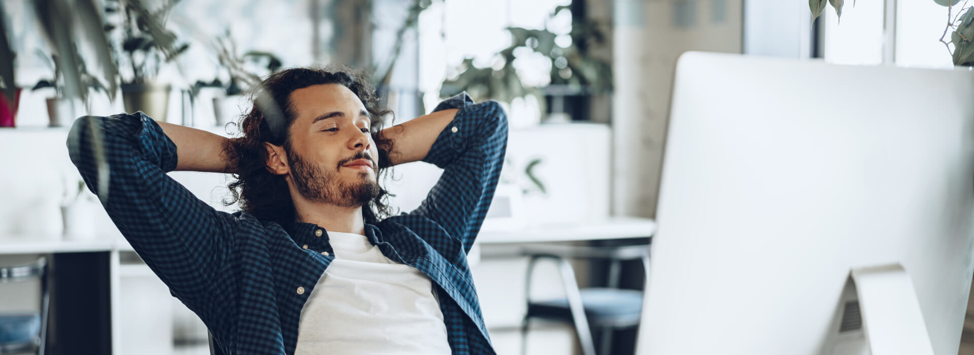 satisfied-man-behind-computer