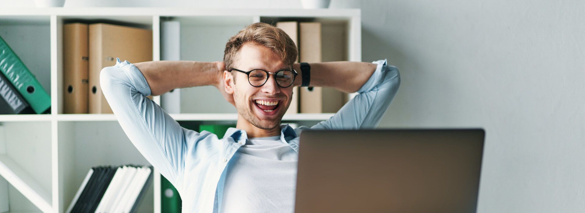 happy-man-behind-computer